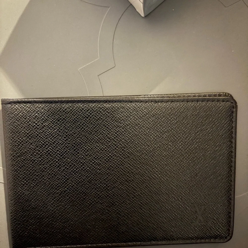 Vintage black Louis Vuitton passport holders‎